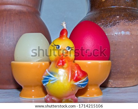 Yellow chick and Easter eggs. Colorful Easter eggs - part of the passover meal. Easter (Bright Sunday of Christ) is the oldest and most important Christian holiday. 