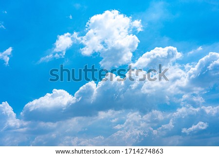 Layers of clouds like huge cotton floating on blue sky