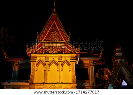 Blurred temple building in Thailand on night
