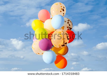 Bunch of colorful balloons outdoors on sunny day