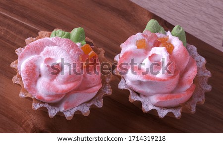 two cakes in the form of a rose, top view