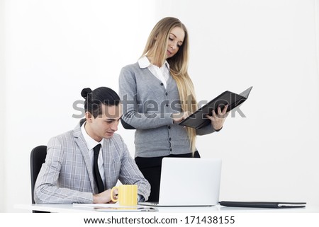 Business people working on laptop, indoor shoot