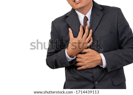 Businessmen grasp the chest with pain on isolated background and clipping path