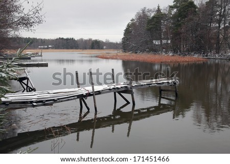 Landscape with a gangway on a lake in Finland