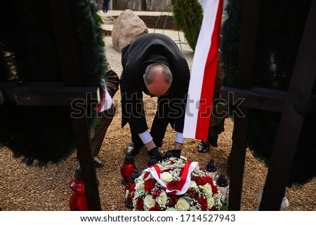 laying a wreath of flowers at the grave of a deceased person, a military farewell ceremony for the tragically deceased, eternal memory and rest in peace