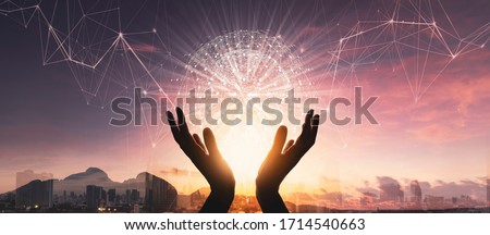 Woman hands holding global network connections and  technology innovative in science and Vr communication concept.Elements of this image furnished by NASA