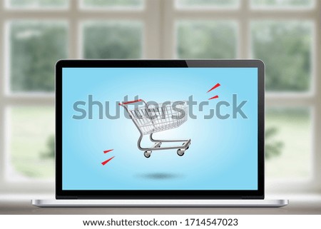 Online shopping concept, shopping cart on a laptop screen