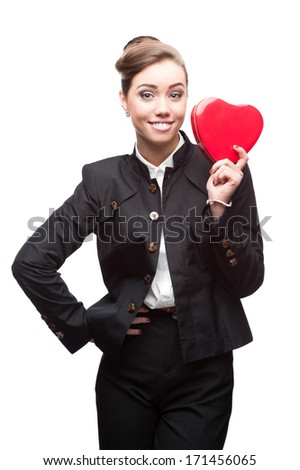 caucasian young happy smiling business woman holding red heart. isolated on white