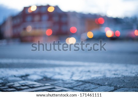 Blurred background - night street with street lights, great for design.