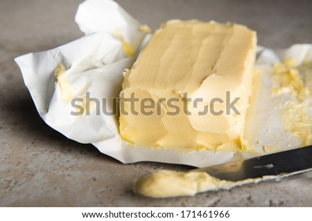 Large Softened Stick of Butter on Wrapping Ready to Eat Royalty-Free Stock Photo #171461966