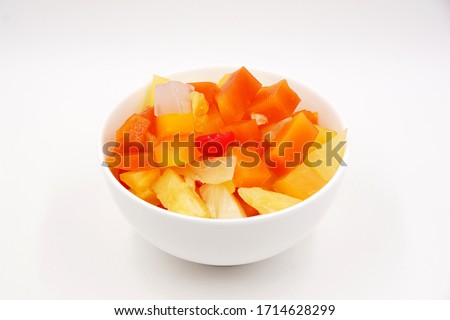 Canned fruit cocktail with pineapple, papaya, Nata de Coco and cherries 
 Royalty-Free Stock Photo #1714628299