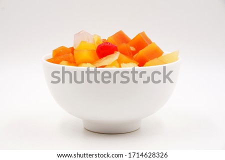 Canned fruit cocktail with pineapple, papaya, Nata de Coco and cherries 
 Royalty-Free Stock Photo #1714628326