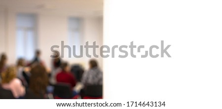 unfocused people silhouette co working lecture hall office room and white background poster space for copy or your text here 