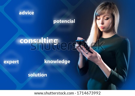 ?onsulting. Woman with a mobile phone. Business woman on a dark background. Concept - providing consulting services. Expert solutions. Advice for business. Concept - providing audit services. Royalty-Free Stock Photo #1714673992