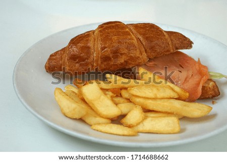 smoked salmon croissant and fries