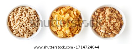 Set of various breakfast cereals isolated on white background, top view Royalty-Free Stock Photo #1714724044