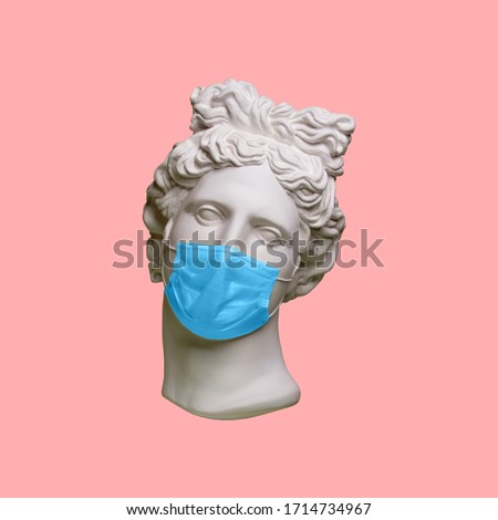 Head Of Apollo In Medical Mask. Novel Coronavirus (2019-nCoV). Concept Of Coronavirus Quarantine. Royalty-Free Stock Photo #1714734967