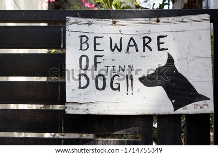 Funny sign to beware of puppy