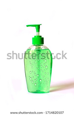 hand sanitizer in a clear pump bottle isolated on a white background. it is used to kill microbes, bacteria and viruses, some of which can cause coronavirus.