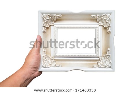 hand holding old vintage frame