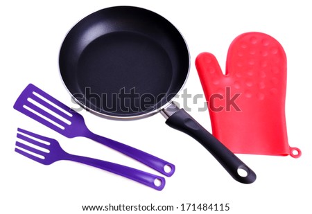 Oven glove and kitchenware isolated on white