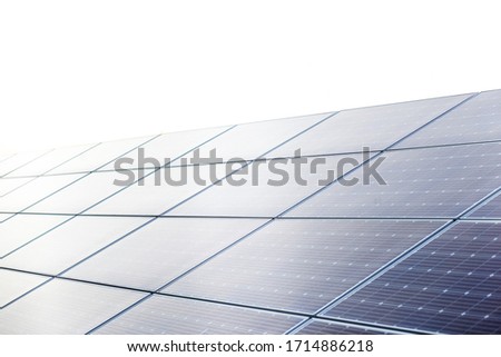 field of solar panels close up at sun set time. Royalty-Free Stock Photo #1714886218