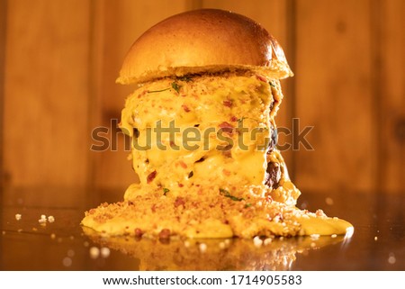 Fresh home-made hamburger served on wood background