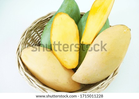 Bright yellow fresh mango And mango slices