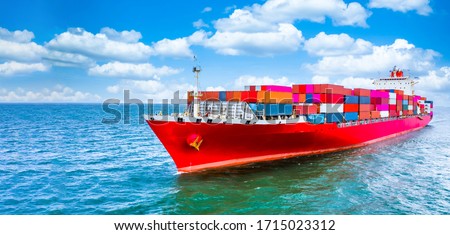 Container cargo ship, Freight shipping maritime vessel, Global business import export commerce trade logistic and transportation oversea worldwide by container cargo ship boat in the open sea. Royalty-Free Stock Photo #1715023312