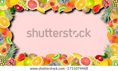 Creative photo of many different exotic tropical bright fruits frame with shadows on a summer soft pink color background. View from above. Bright summer fruit pattern with copy space.