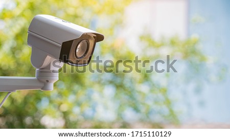 IP CCTV camera install by have water proof cover to protect camera with home security system concept. Royalty-Free Stock Photo #1715110129