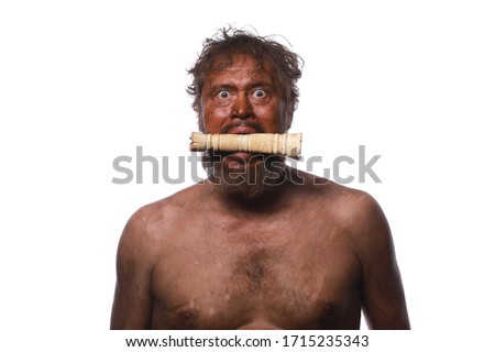 Neanderthal, primitive caveman with bone