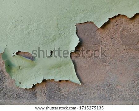 Peeling paint on the wall