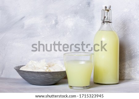 Milk serum. Whey from homemade cottage cheese.  Royalty-Free Stock Photo #1715323945