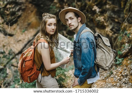 A man and a woman in a cave, a journey
