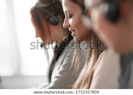 close up. the female operator communicates with the client Royalty-Free Stock Photo #1715357809