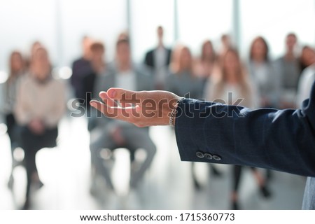 background image of a speaker making a report for a working group Royalty-Free Stock Photo #1715360773