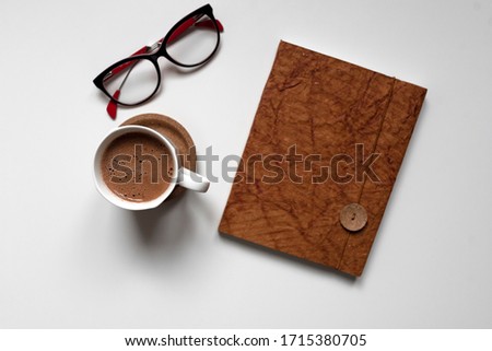 Cup of hot chocolate on a white background. Top view