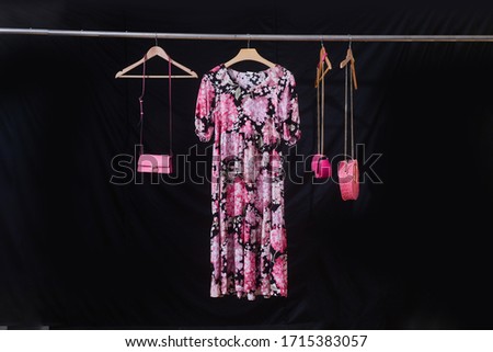 Spring with summer fashion woman long floral pattern dress and three  pink handbag  hanger-black background 