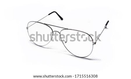 Transparent glasses in the unfolded state on a white background