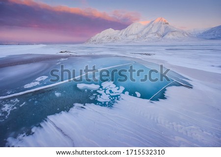  norway landscape nature of the mountains of Spitsbergen Longyearbyen  Svalbard   arctic ocean winter  polar day pink sunset sky