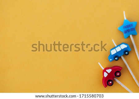  Multi-colored candle cars with space for text. The concept of children's holiday, International Children's Day. 