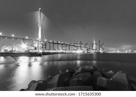 Suspension bridge in Hong Kong harbor at night