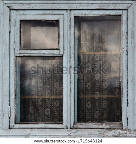 Old wooden window. Vintage frame texture with peeling paint. Royalty-Free Stock Photo #1715643124