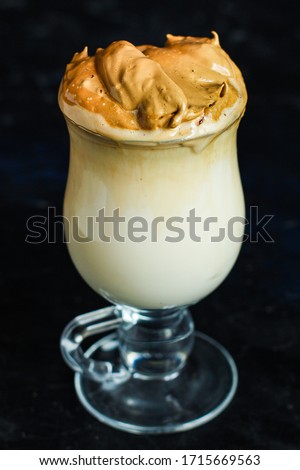 Dalgona coffee trend ice drink
cappuccino or latte fluffy creamy whipped
Menu concept healthy eating. food background top view copy space for text