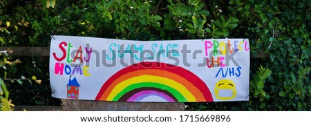 Rainbows hanging outside a day nursery during the Coronavirus pandemic to lift peoples spirits during this difficult time.