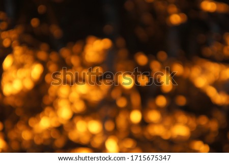 Wallpaper with golden and yellow bokeh effect