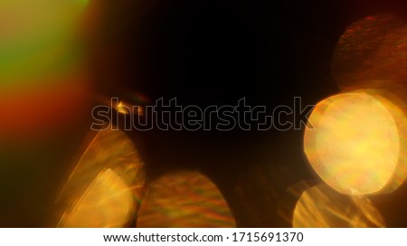 Rainbow Colors Optical Flare Abstract Bokeh and Light Leaks Photo Overlays with Camera Lens Film Burn  Defocused Blur Reflection Bright Sunlights. Use in Screen Overlay Mode for Photo Processing. Royalty-Free Stock Photo #1715691370