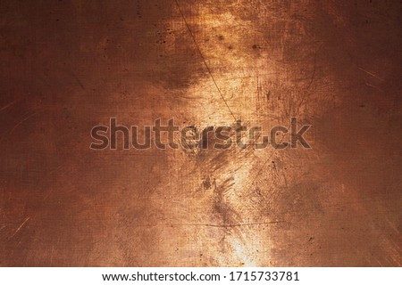 Copper surface. bronze background. metal plate with spots and scratches. brown grunge texture Royalty-Free Stock Photo #1715733781