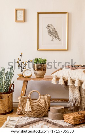 Stylish composition of living room interior with mock up frame, wooden bench, pillow, plaid, woman bag, plant, decortaion and elegant personal accessories in modern home decor.